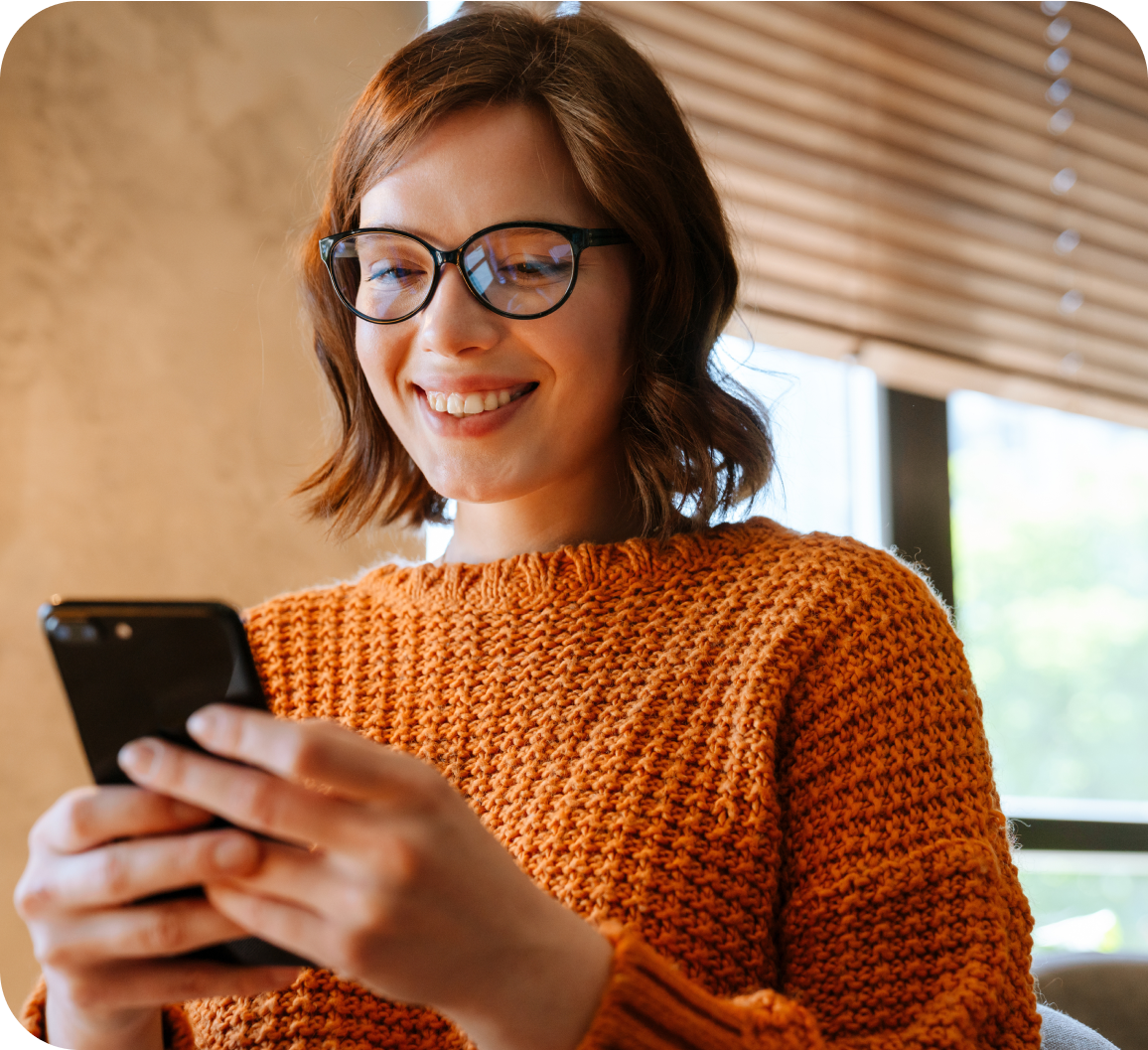 A young woman checking her phone