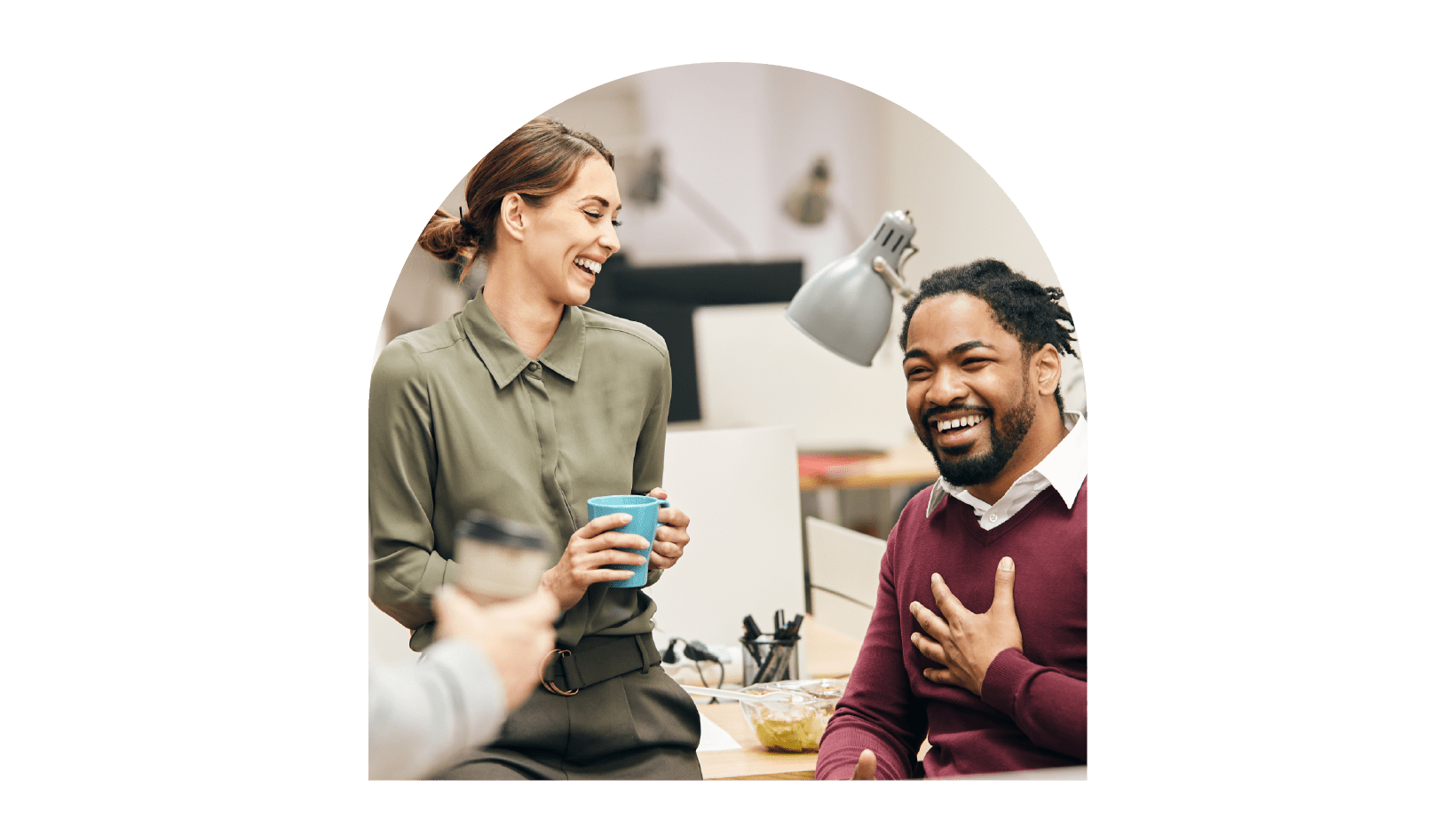 A young professionals in a discussion over coffee break