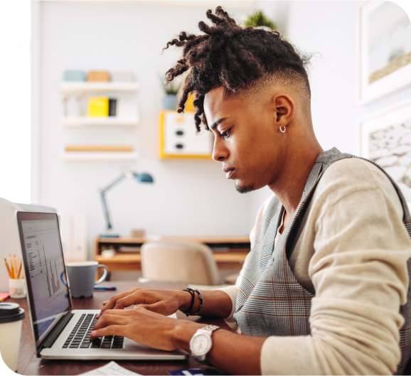 Focused employee working on laptop