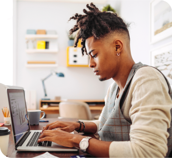 Focused employee working on laptop