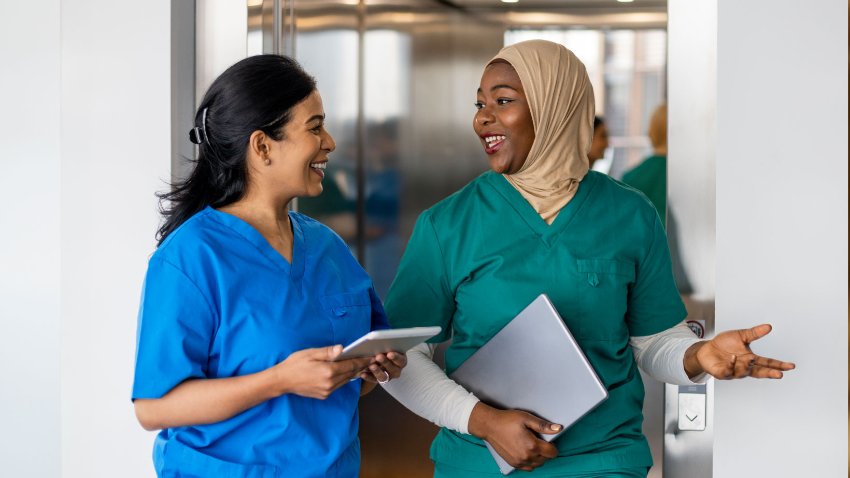 Two healthcare women in a discussion